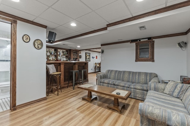 3560 Jeremy Ranch Ct, Naperville, IL 60564 - living room with a bar, wood finished floors, ornamental molding, recessed lighting, and a drop ceiling