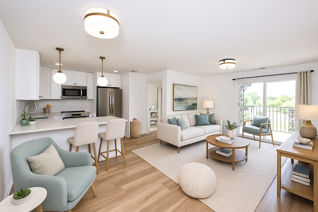 9396 Landings Ln Unit 305, Des Plaines, IL 60016 - living room featuring light wood finished floors