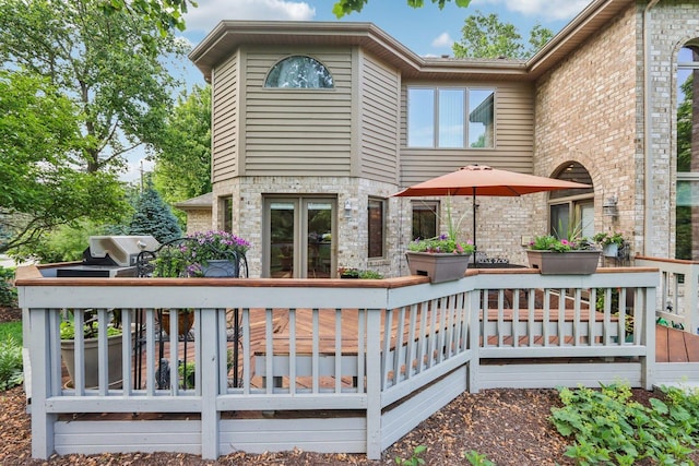 11624 Kluth Ct, Mokena, IL 60448 - wooden deck with french doors and a grill