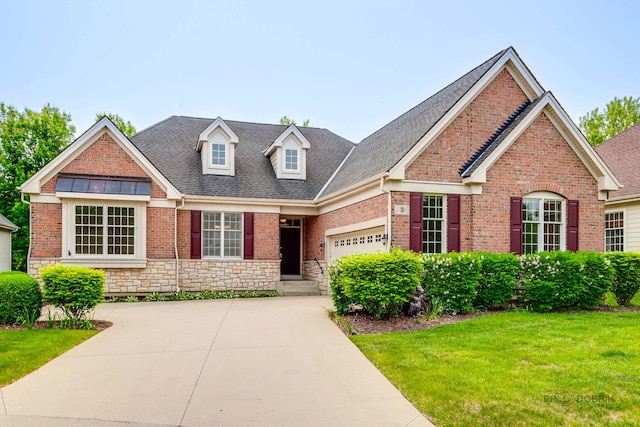 3 Joshua Ct, South Barrington, IL 60010 - view of front of property with an attached garage, a front yard, a shingled roof, concrete driveway, and brick siding