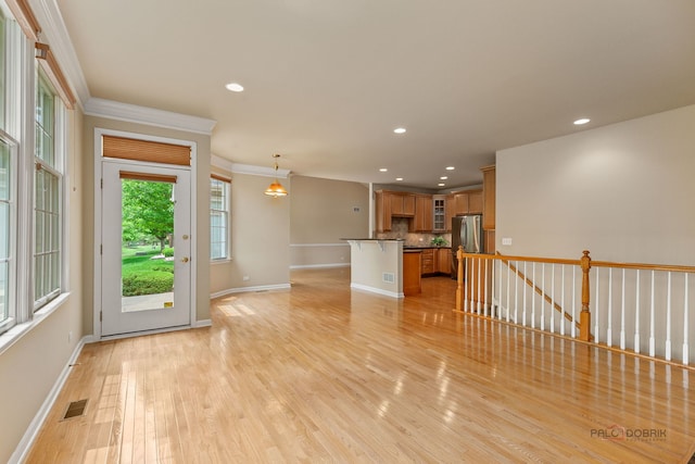 3 Joshua Ct, South Barrington, IL 60010 - unfurnished living room with baseboards, light wood finished floors, recessed lighting, and crown molding