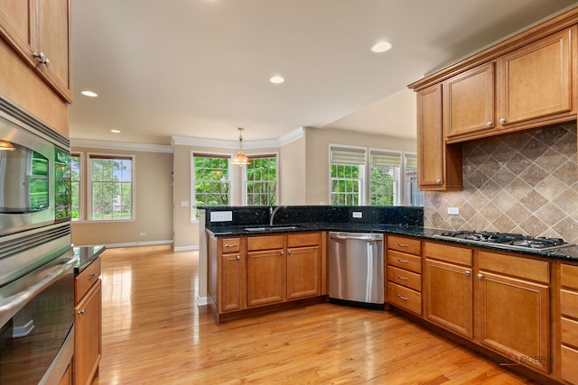 3 Joshua Ct, South Barrington, IL 60010 - kitchen with appliances with stainless steel finishes, decorative backsplash, light wood-style floors, ornamental molding, and a sink