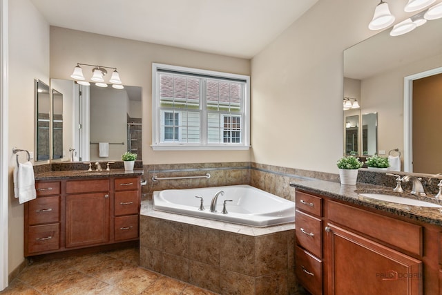3 Joshua Ct, South Barrington, IL 60010 - bathroom with two vanities, a garden tub, and tile patterned floors