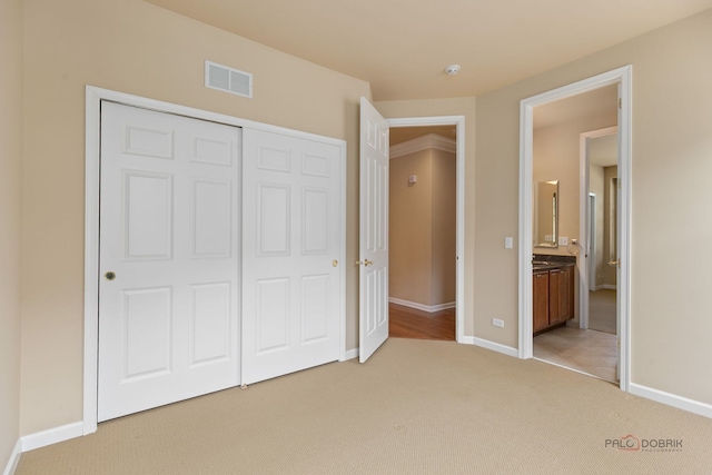 3 Joshua Ct, South Barrington, IL 60010 - unfurnished bedroom with light colored carpet, a closet, and baseboards