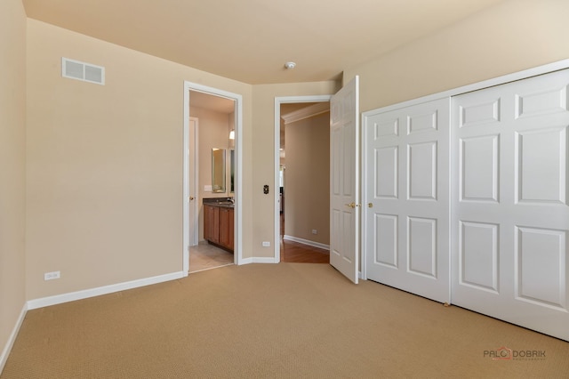 3 Joshua Ct, South Barrington, IL 60010 - unfurnished bedroom with light colored carpet, baseboards, a closet, and connected bathroom