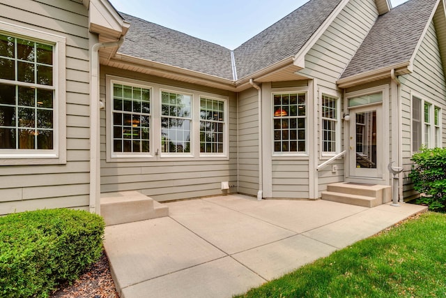 3 Joshua Ct, South Barrington, IL 60010 - view of exterior entry featuring roof with shingles and a patio area