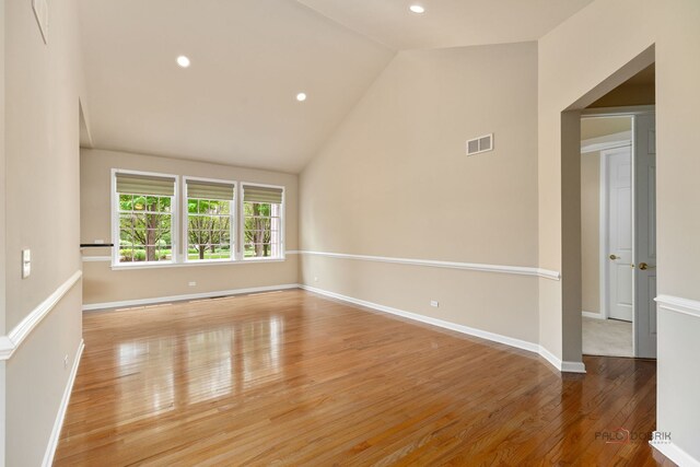 3 Joshua Ct, South Barrington, IL 60010 - unfurnished room featuring wood finished floors, lofted ceiling, recessed lighting, and baseboards