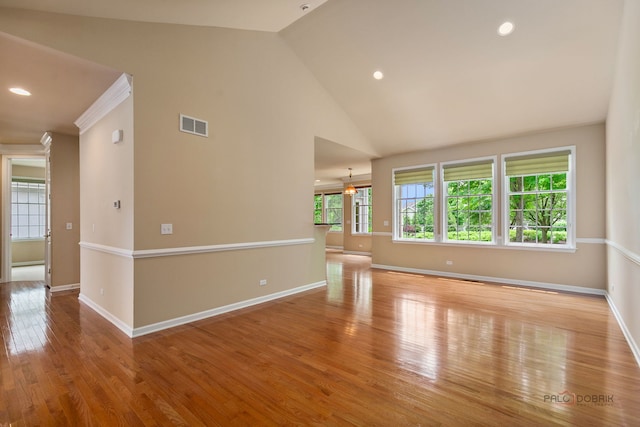 3 Joshua Ct, South Barrington, IL 60010 - unfurnished room with wood finished floors, baseboards, recessed lighting, a chandelier, and high vaulted ceiling