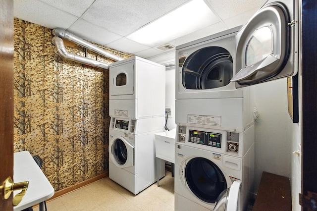 1258 Brown St Unit 204, Des Plaines, IL 60016 - shared laundry featuring stacked washer / drying machine, washing machine and dryer, and light flooring