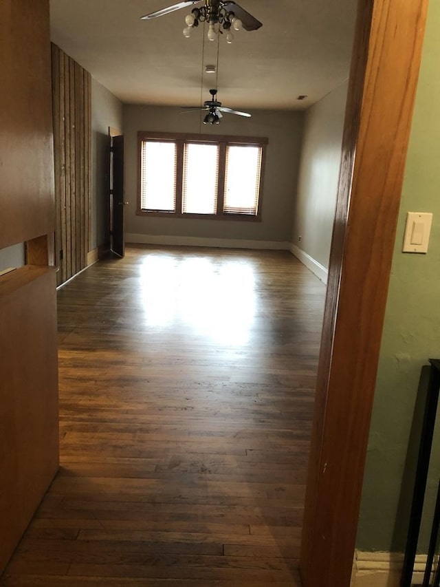 1252 W Chicago Ave, Chicago, IL 60642 - spare room featuring dark wood-style flooring and a ceiling fan