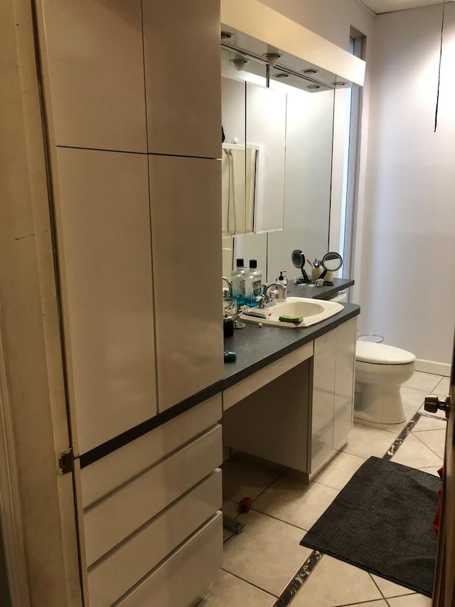 1252 W Chicago Ave, Chicago, IL 60642 - bathroom featuring tile patterned floors and vanity