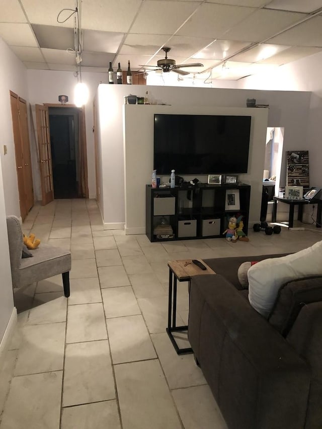 1252 W Chicago Ave, Chicago, IL 60642 - living area featuring a drop ceiling, a ceiling fan, and light tile patterned flooring