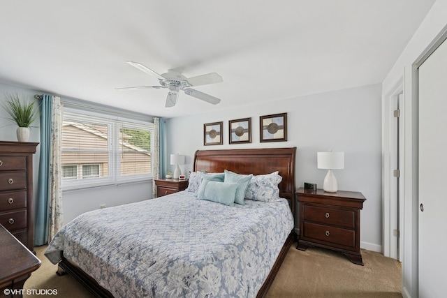 2734 N Dryden Pl, Arlington Heights, IL 60004 - bedroom with light colored carpet, ceiling fan, and baseboards