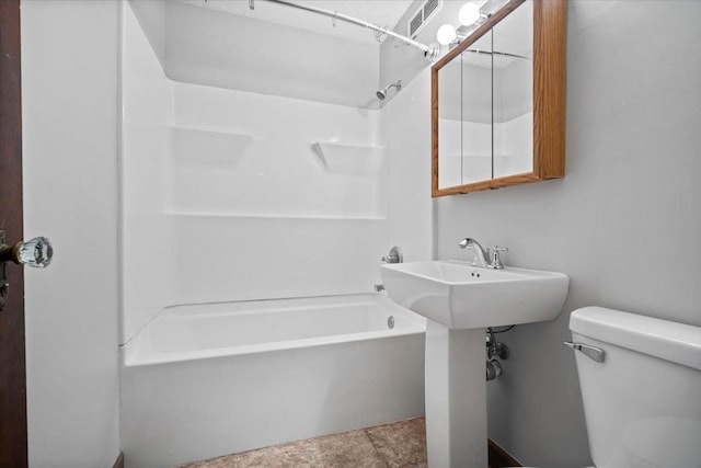 703 Samantha St, Normal, IL 61761 - bathroom with bathtub / shower combination and toilet