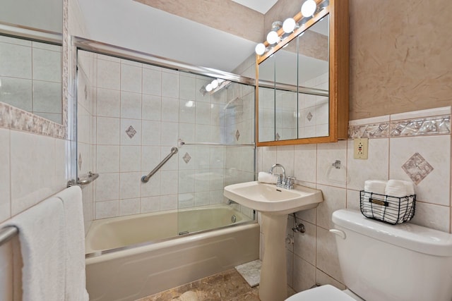 1050 W Columbia Ave Unit 3H, Chicago, IL 60626 - bathroom with toilet, enclosed tub / shower combo, tile walls, stone finish flooring, and a sink