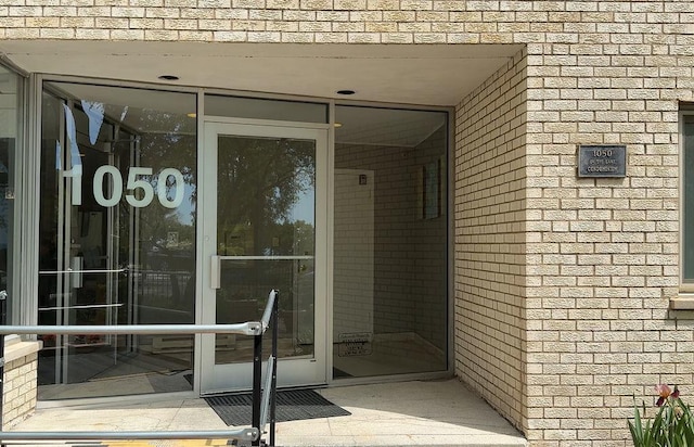 1050 W Columbia Ave Unit 3H, Chicago, IL 60626 - view of exterior entry with brick siding