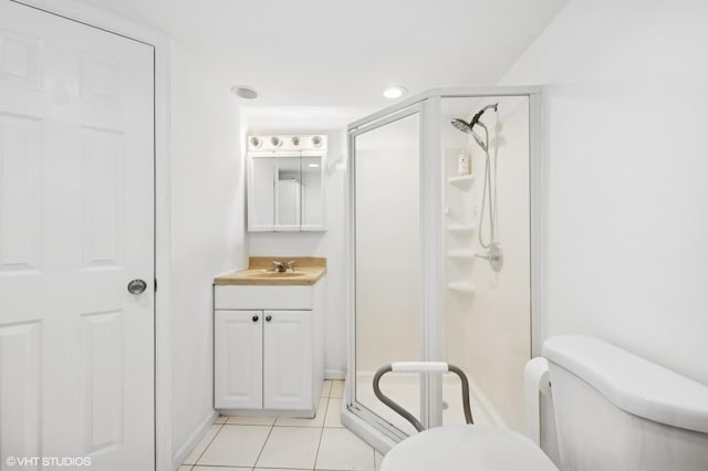 9519 Kolmar Ave, Skokie, IL 60076 - full bathroom featuring a shower stall, vanity, tile patterned flooring, and toilet