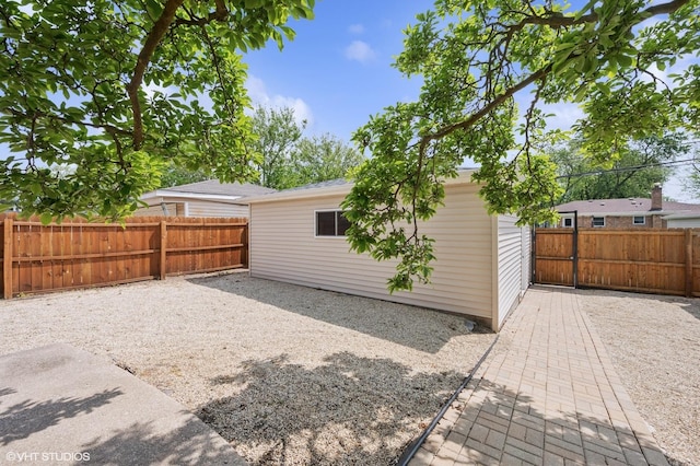 9519 Kolmar Ave, Skokie, IL 60076 - rear view of property featuring an outdoor structure
