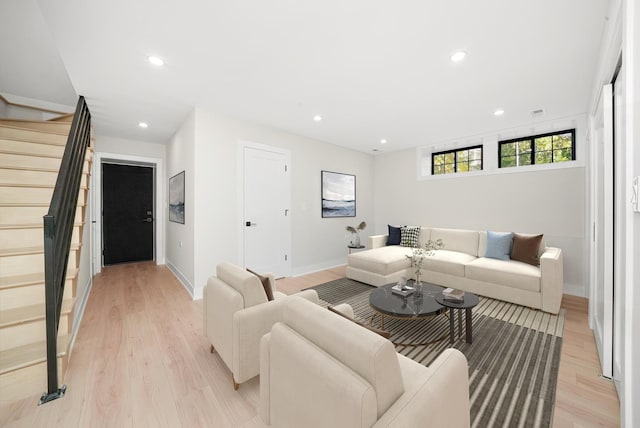 4153 N Hermitage Ave, Chicago, IL 60613 - living room with stairs, light wood-type flooring, baseboards, and recessed lighting