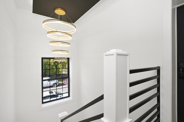 4153 N Hermitage Ave, Chicago, IL 60613 - staircase with a chandelier