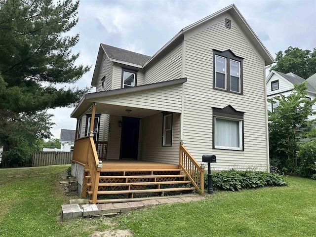 639 W Elk St, Freeport, IL 61032 - rear view of house with a porch