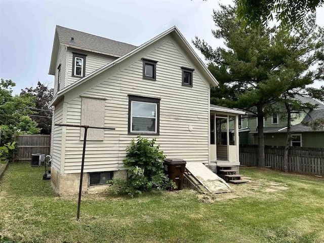 639 W Elk St, Freeport, IL 61032 - back of house with central AC unit