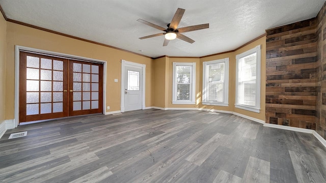 639 W Elk St, Freeport, IL 61032 - unfurnished living room with a ceiling fan, dark wood-style floors, ornamental molding, french doors, and baseboards