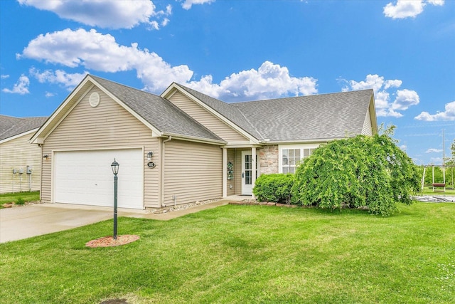 3407 Nobel Dr, Champaign, IL 61822 - view of front of property with an attached garage, driveway, a shingled roof, and a front yard