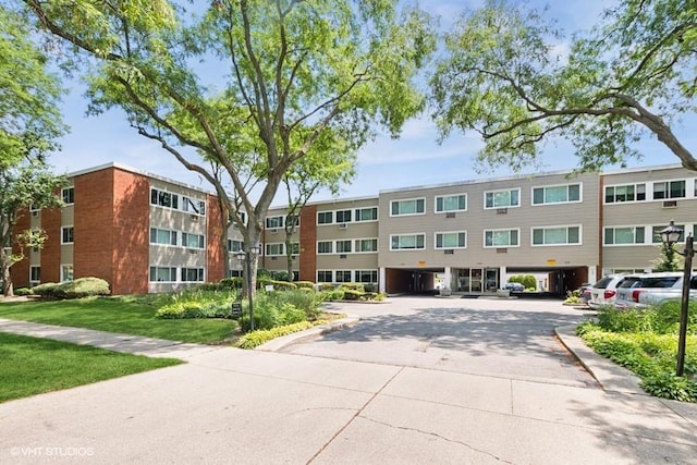 1137 Leavitt Ave Unit 118, Flossmoor, IL 60422 - view of building exterior with a parking lot