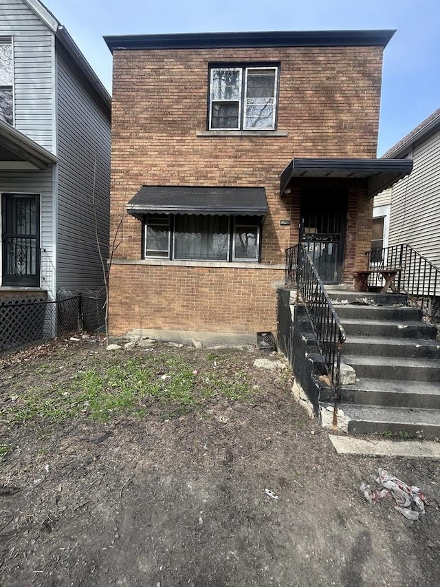 9438 S Champlain Ave, Chicago, IL 60619 - view of front of property featuring brick siding