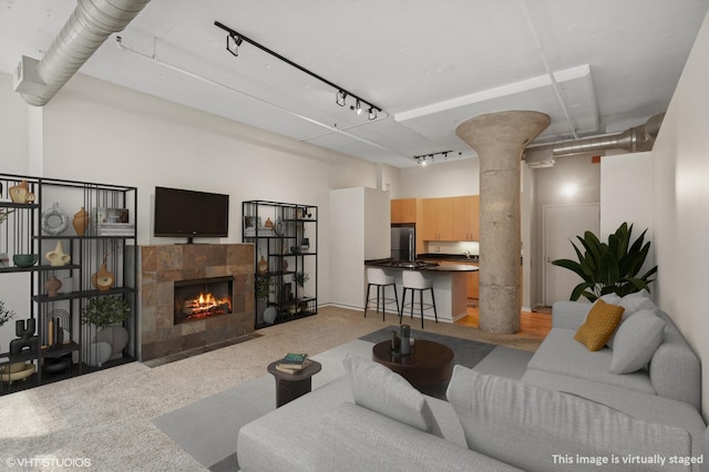130 S Canal St Unit 210, Chicago, IL 60606 - living room with track lighting and a fireplace