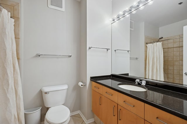 130 S Canal St Unit 210, Chicago, IL 60606 - bathroom featuring vanity, a shower with curtain, and tile patterned floors