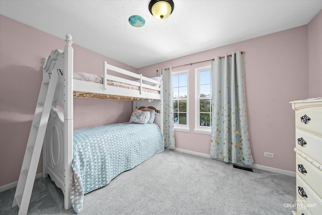 28 Waterbury Cir, Oswego, IL 60543 - carpeted bedroom with baseboards