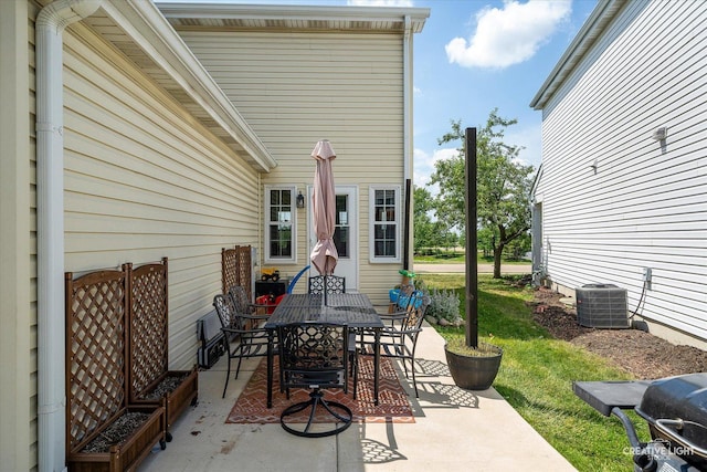 28 Waterbury Cir, Oswego, IL 60543 - view of patio / terrace featuring outdoor dining space and area for grilling