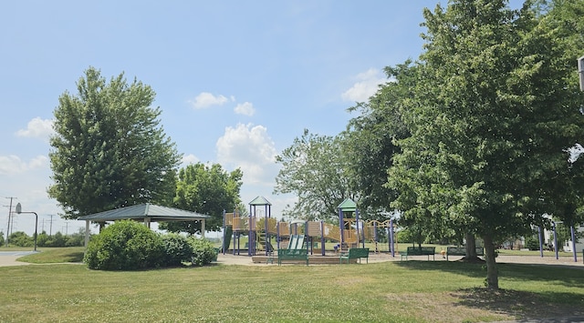 28 Waterbury Cir, Oswego, IL 60543 - community jungle gym featuring a lawn and a gazebo