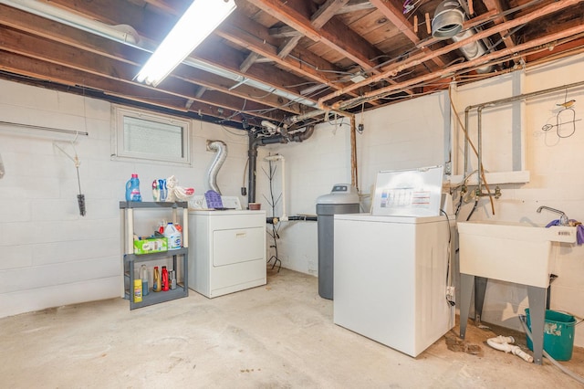 424 Robinson St, Earlville, IL 60518 - unfinished below grade area with separate washer and dryer and concrete block wall