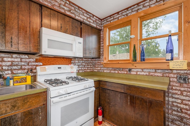 424 Robinson St, Earlville, IL 60518 - kitchen with white appliances and light countertops