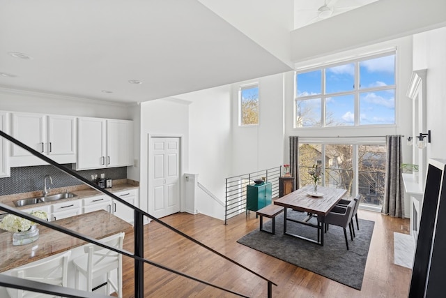 1632 W Erie St Unit 3, Chicago, IL 60622 - dining space featuring a towering ceiling and light wood finished floors