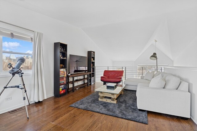 1632 W Erie St Unit 3, Chicago, IL 60622 - living room with vaulted ceiling, wood finished floors, and ceiling fan