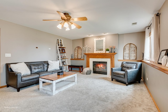 2665 Daniel Lewis Dr, New Lenox, IL 60451 - carpeted living room with a ceiling fan, a fireplace, and baseboards