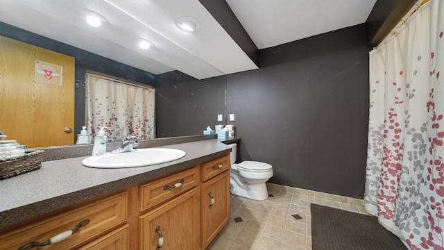 3894 E Whippoorwill Ln, Byron, IL 61010 - full bathroom with vanity, toilet, tile patterned flooring, baseboards, and curtained shower