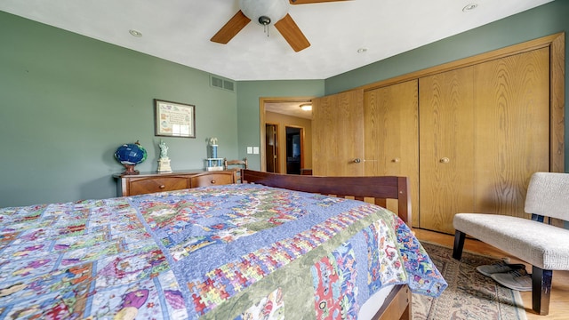 3894 E Whippoorwill Ln, Byron, IL 61010 - bedroom featuring a closet, ceiling fan, and wood finished floors