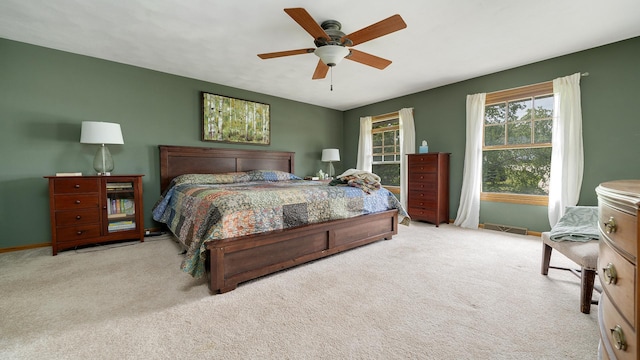 3894 E Whippoorwill Ln, Byron, IL 61010 - carpeted bedroom with baseboards and ceiling fan
