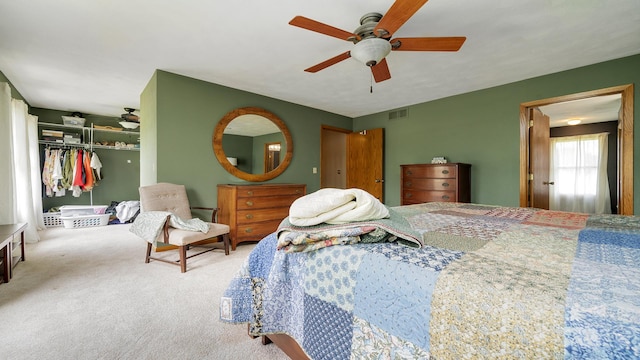 3894 E Whippoorwill Ln, Byron, IL 61010 - bedroom featuring a closet, carpet flooring, and a ceiling fan