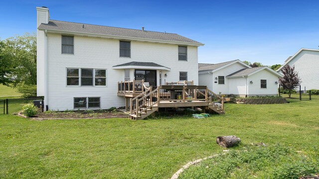 3894 E Whippoorwill Ln, Byron, IL 61010 - rear view of property featuring a chimney, a wooden deck, and stairway