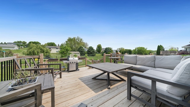 3894 E Whippoorwill Ln, Byron, IL 61010 - wooden deck with an outdoor hangout area and area for grilling
