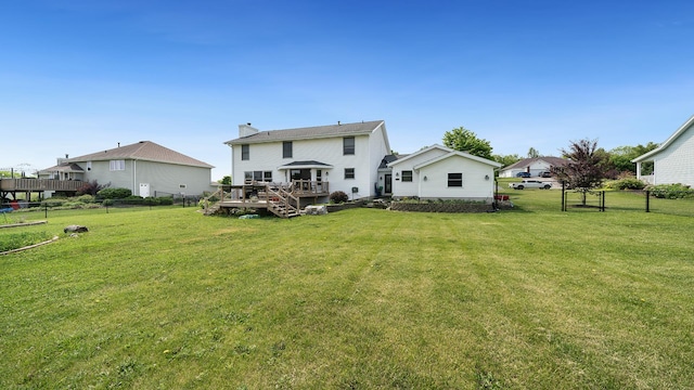 3894 E Whippoorwill Ln, Byron, IL 61010 - back of property with a deck