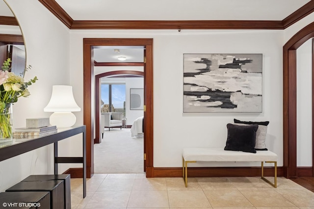 161 E Chicago Ave Unit 39F, Chicago, IL 60611 - hallway featuring crown molding, light colored carpet, baseboards, and arched walkways