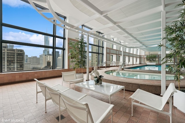 161 E Chicago Ave Unit 39F, Chicago, IL 60611 - sunroom / solarium with a hot tub and a city view