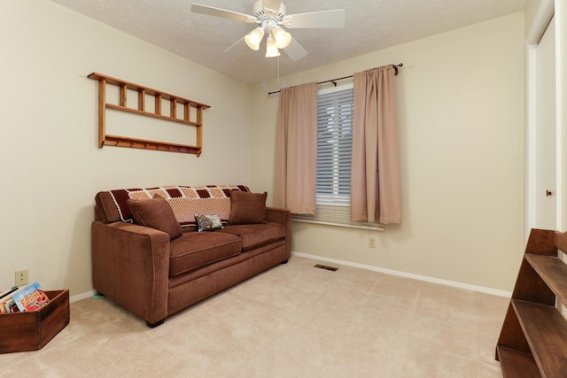 41 Brandywine Ct Unit 41, Bloomington, IL 61704 - carpeted living room with a ceiling fan and baseboards